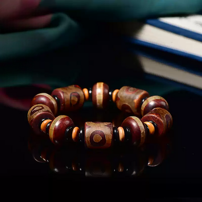 Tibetan Nine-Eye Dzi Bead Bracelet – Ancient Energy Hacks for Modern Souls