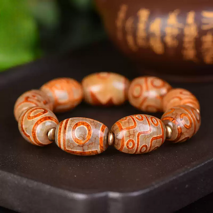 Natural Tibetan Wind-Carved Nine-Eye Dzi—Double Tiger Tooth Agate Bracelet