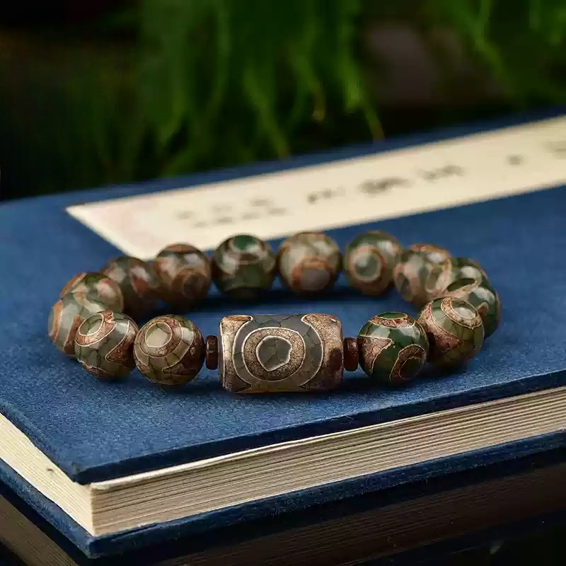 Tibetan Nine-Eye Dzi Bead Bracelet – Ancient Energy Hacks for Modern Souls