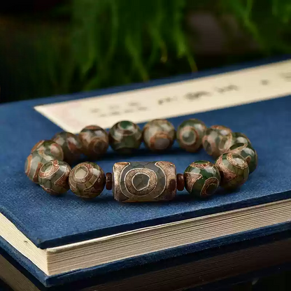 Tibetan Nine-Eye Dzi Bead Bracelet – Ancient Energy Hacks for Modern Souls