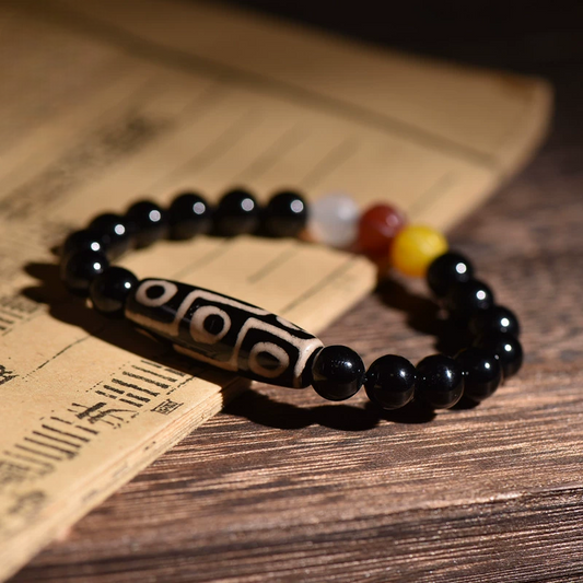 Tibetan Agate Nine-Eye Dzi Bracelet – The Universe’s Algorithm Woven into Stone