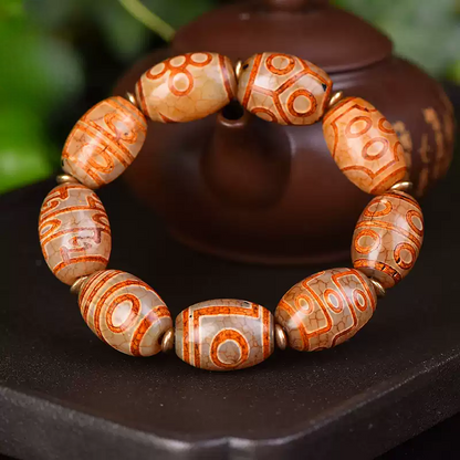 Natural Tibetan Wind-Carved Nine-Eye Dzi—Double Tiger Tooth Agate Bracelet