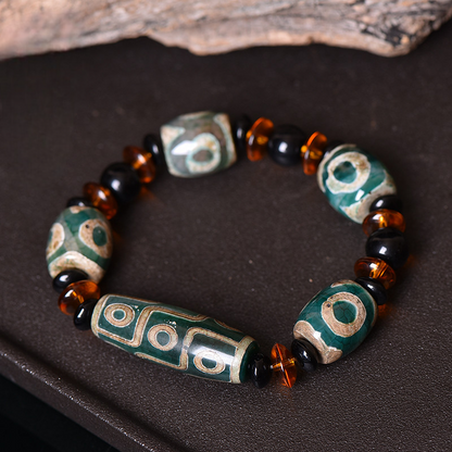 Ancient Tibetan Three-Eye Dzi Bead Bracelet – The Trinity Code of Time, Space, and Consciousness