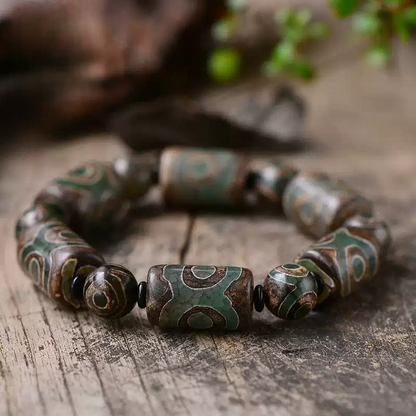 Tibetan Nine-Eye Dzi Bead Bracelet – Ancient Energy Hacks for Modern Souls